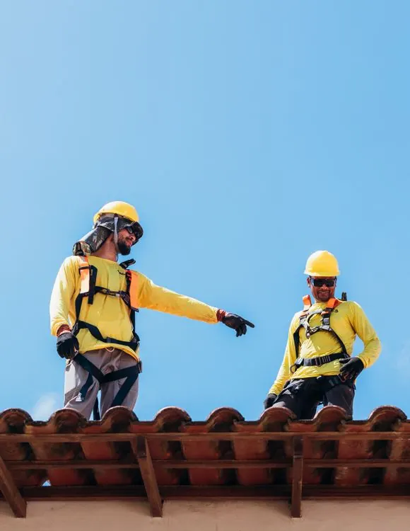 Roofing workers installing a new roof